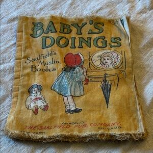 Muslin Book - Baby's Doings in Yellow and Red